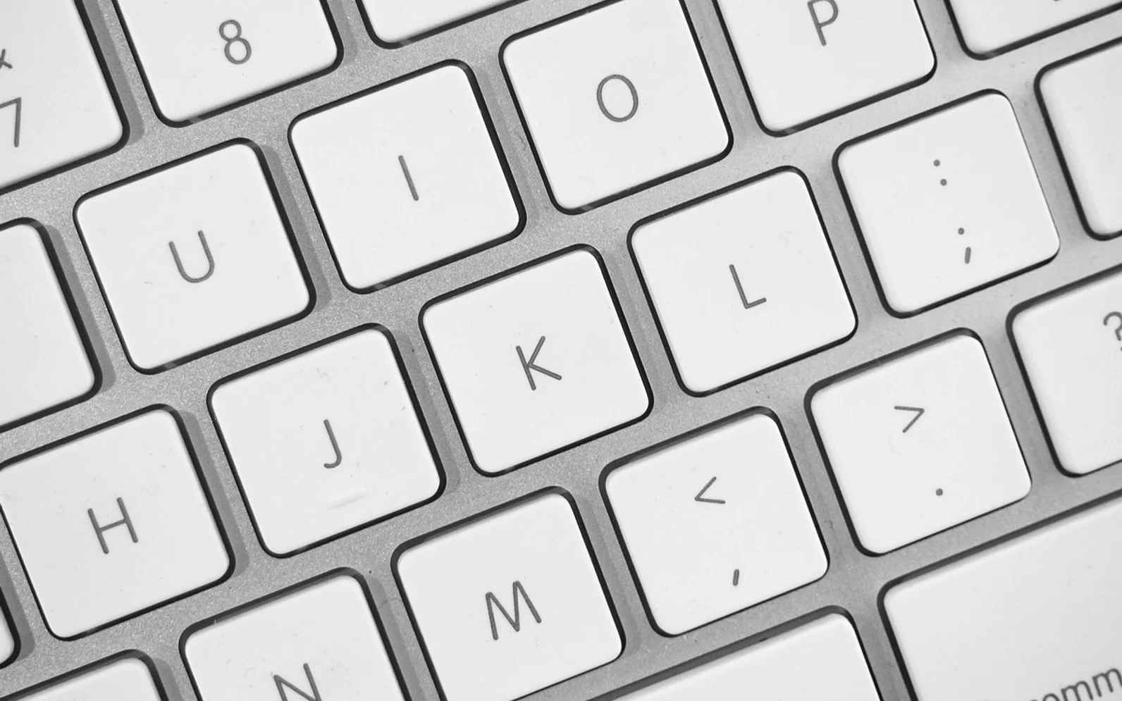 Computer, keyboard and letters